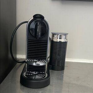 Nespresso Black and Silver Coffee Maker with Milk Frother